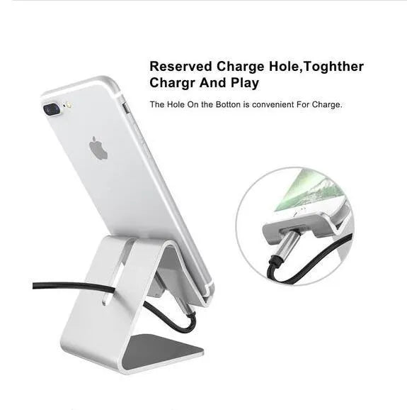 Aluminium alloy foldable tablet stand in gold holding a smartphone on a desk