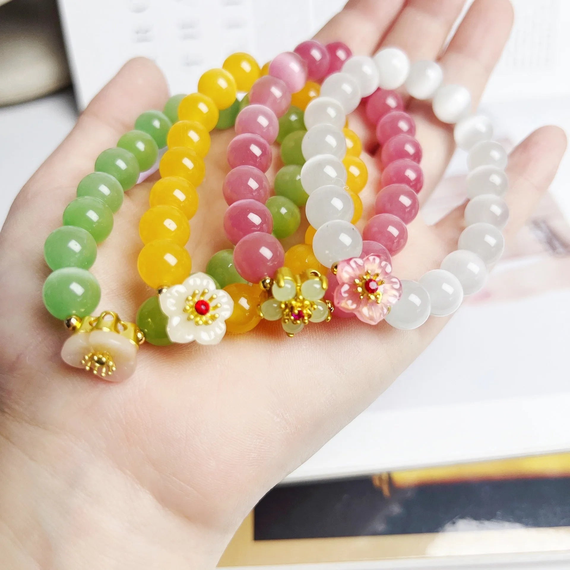 Handmade glass bracelet with floral beads in yellow, pink, white or green colour options