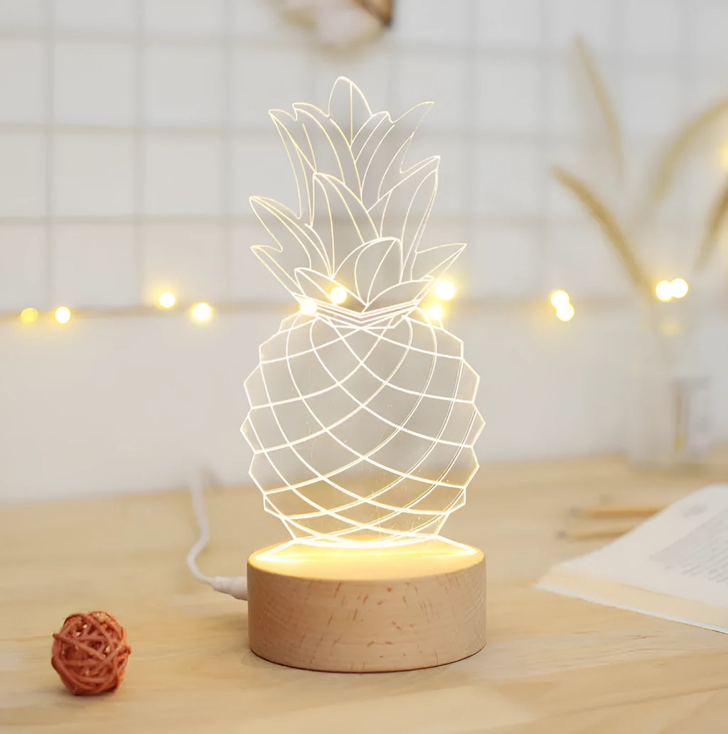 Wood and acrylic pineapple-shaped night light with dimmer switch, measuring 24.5cm tall.
