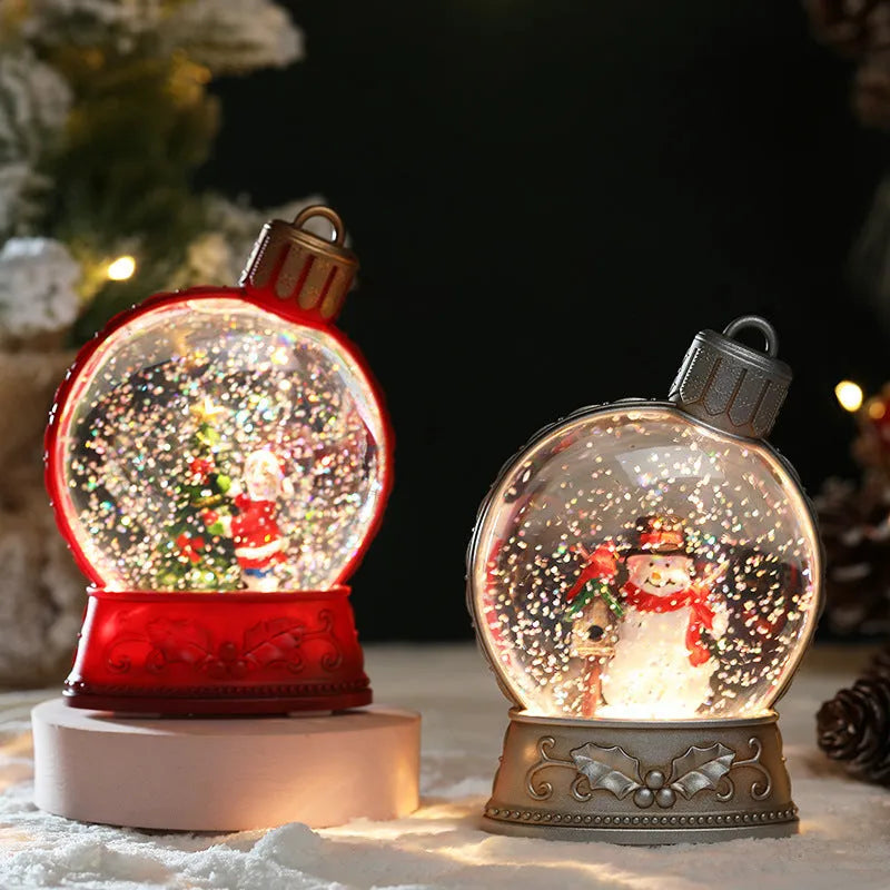 Set of four battery-powered LED Christmas decoration figures including old man, snowman, child tree and angel