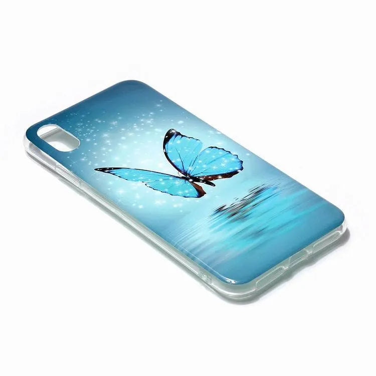 Luminous phone case with cartoon butterfly design for iPhone, glowing in low light.