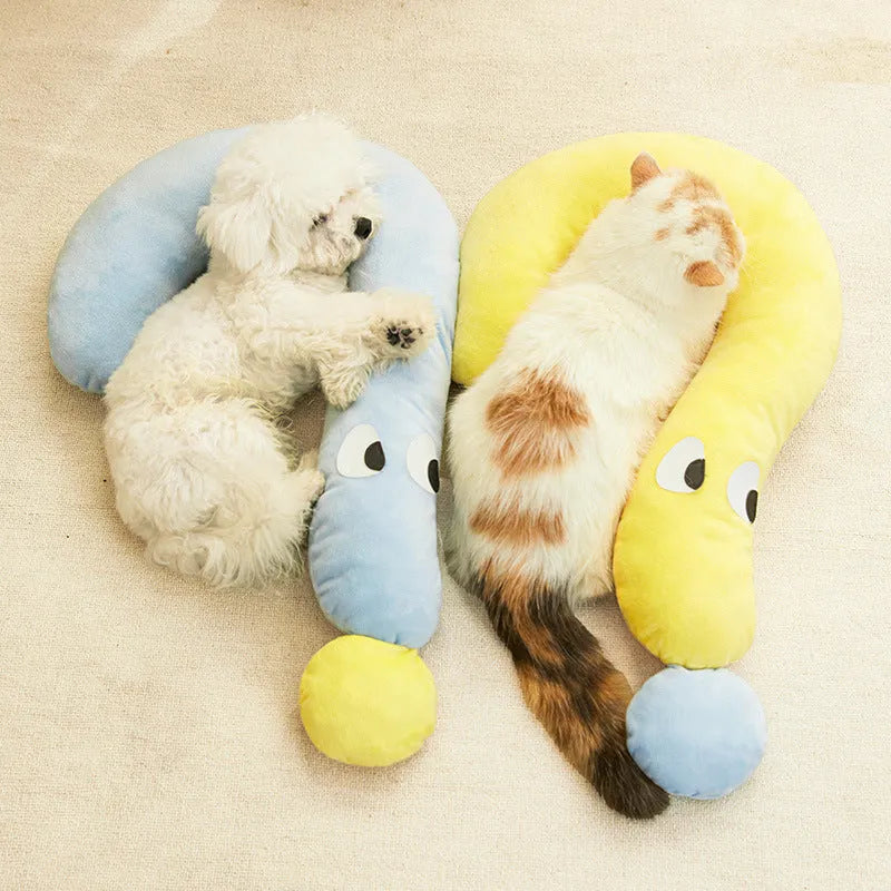 Blue rectangular pet pillow for cats and dogs on a floor, showing its 62cm by 39cm size.