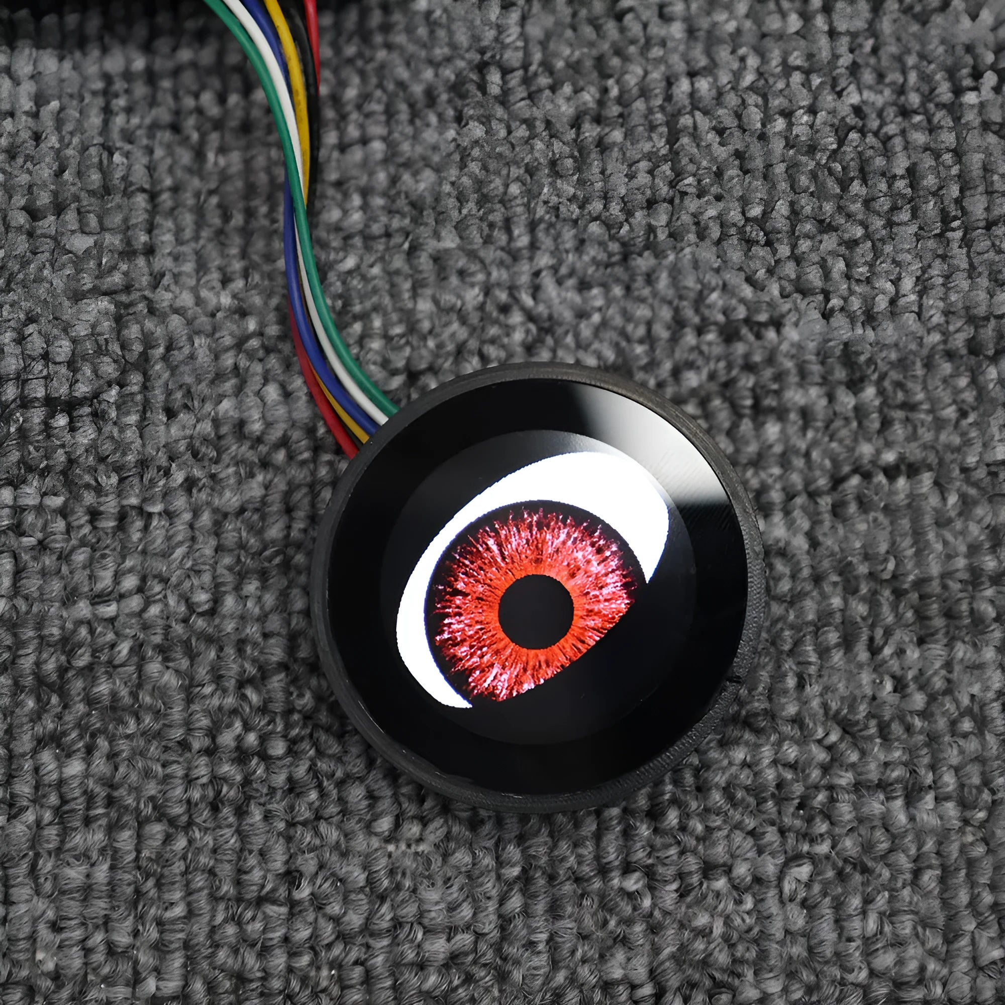 Motorcycle multi-mode dynamic LED demon eye decoration with ABS housing on black background