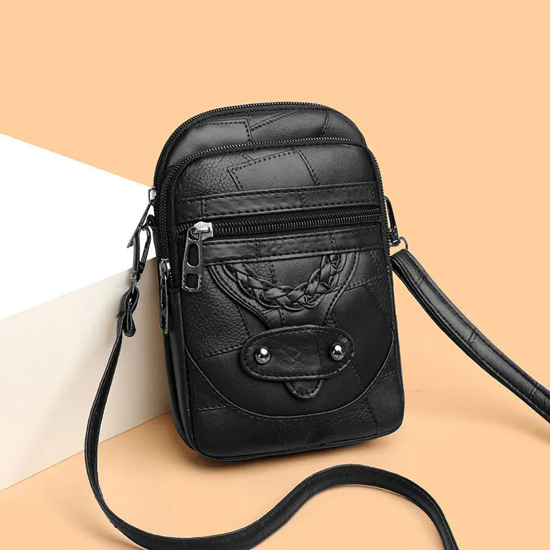 Soft brown PU leather square vertical mobile phone bag with woven detailing and rivets.