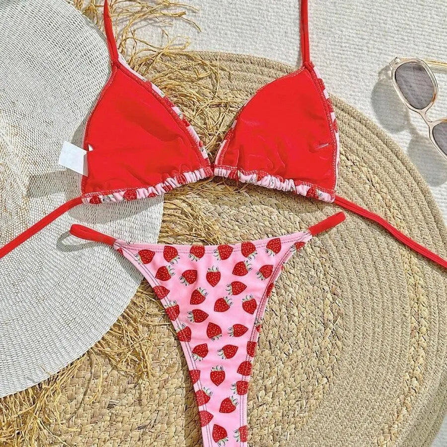 Women's pink strawberry print lace-up triangle bikini set with polyester-nylon fabric for swimming