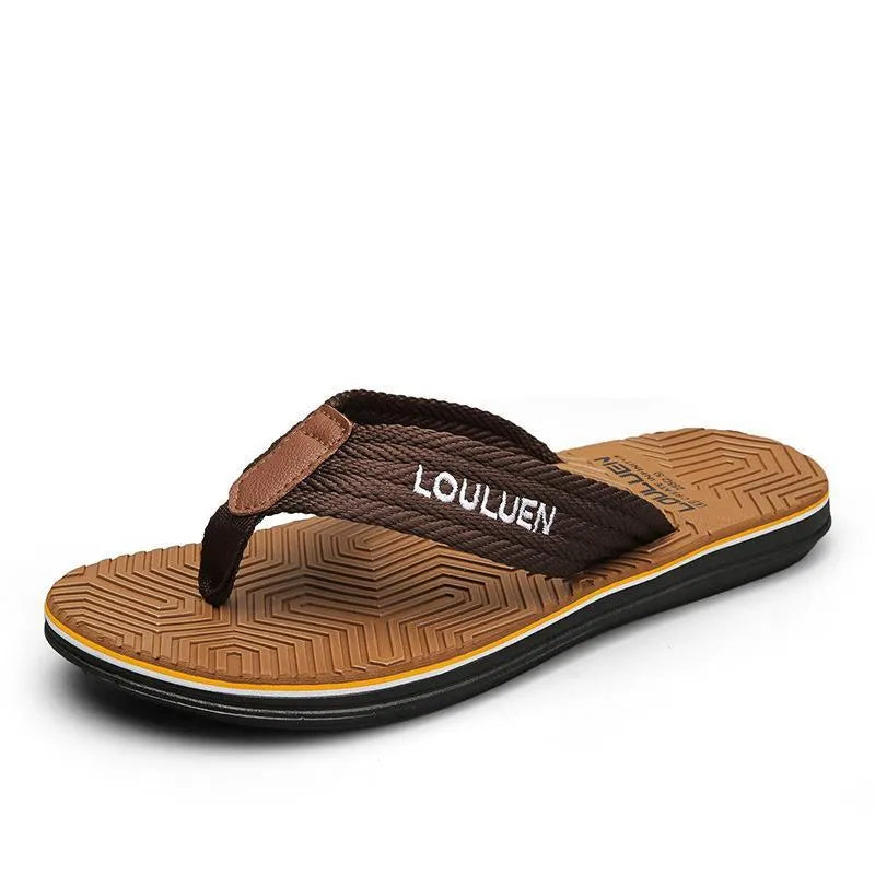 Men's black flip flops with non-slip sole and EVA upper on a beach background
