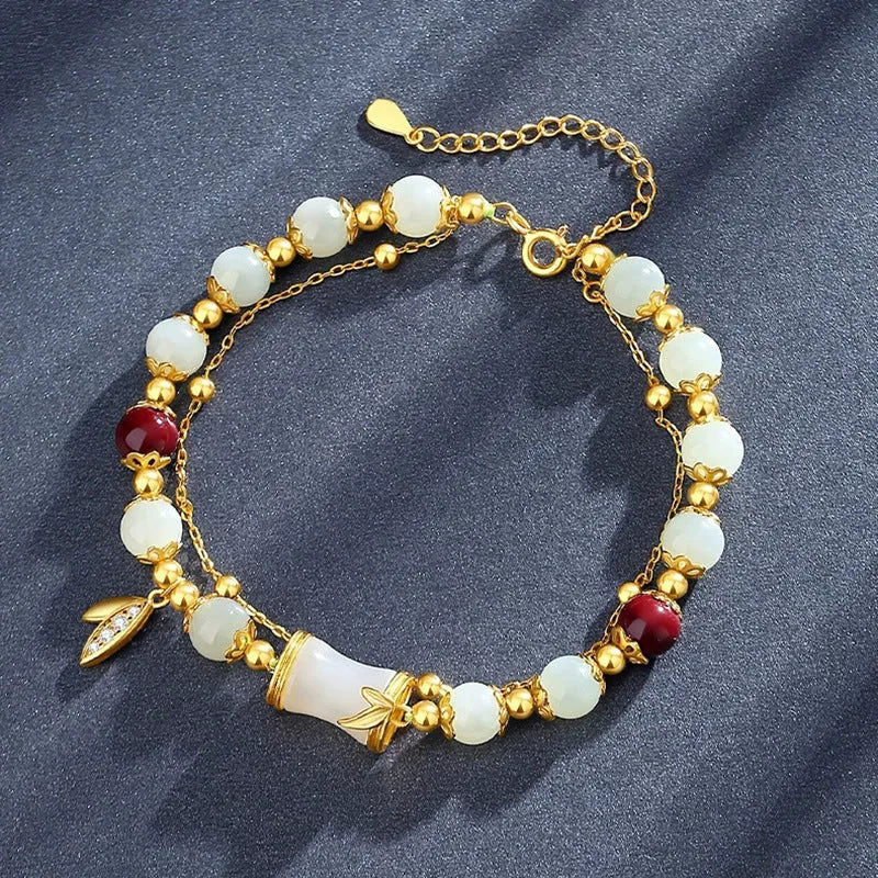 Retro bamboo design bracelet with flower shape and Ruyi elements in coloured glaze construction