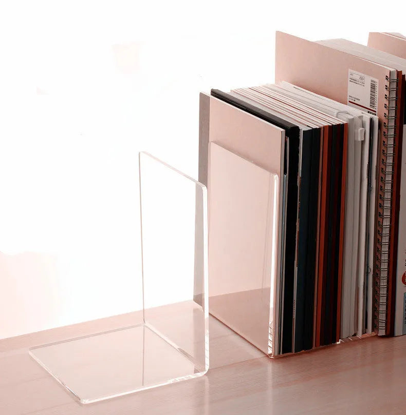 Clear transparent acrylic bookshelf displaying books on desk with smooth edges and minimalist design