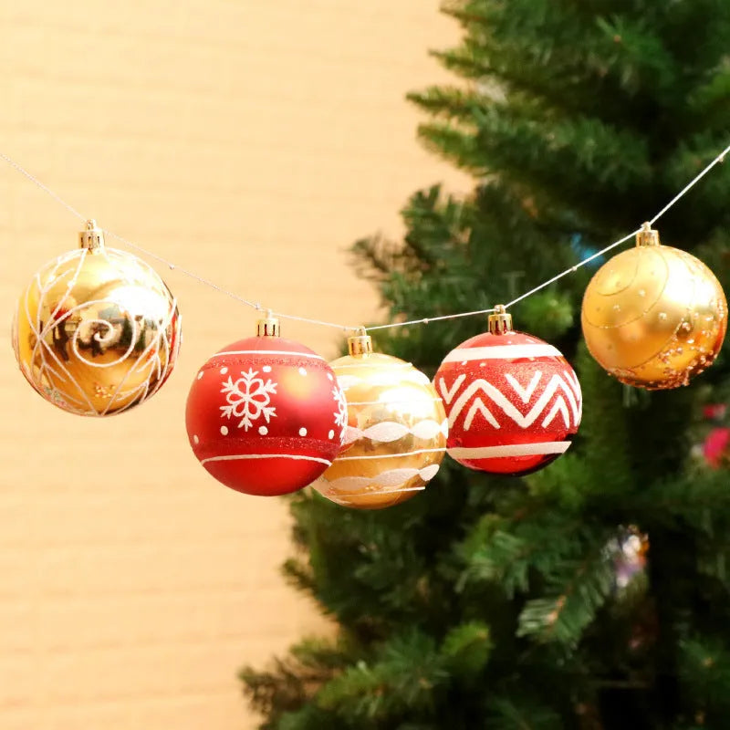 Hand painted 6cm Christmas baubles in various colours including red, gold, green, and blue.