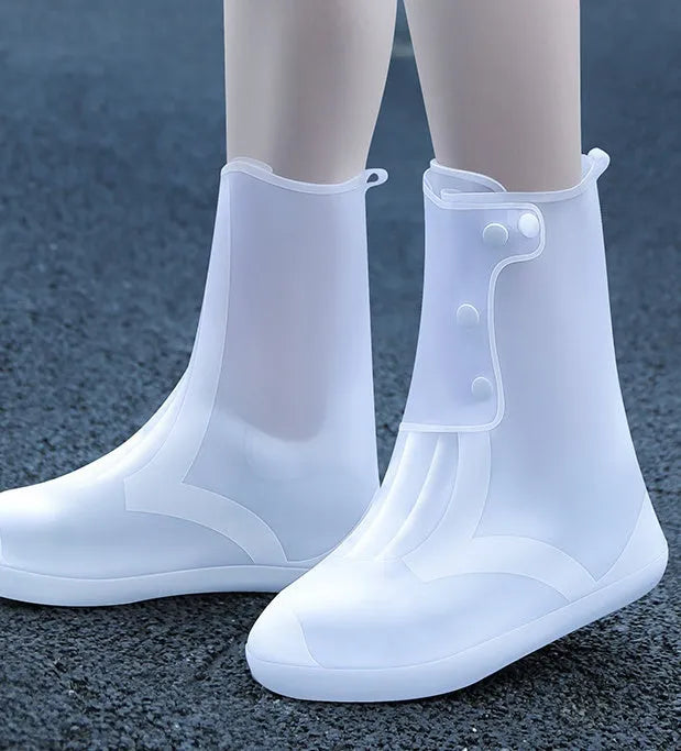 White reusable PVC high-top waterproof shoe cover for women with anti-skid sole.