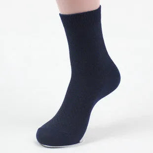 Men's bamboo fibre crew sock with small square pattern in black, navy, grey, and grey-blue colours.