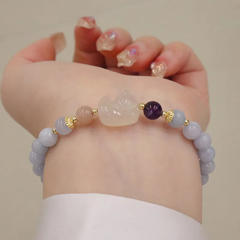 Women's aquamarine artificial crystal bracelet with gold-plated chalcedony pendant in floral design