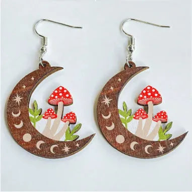 Brown wooden drop earrings with printed mushroom pattern on white background