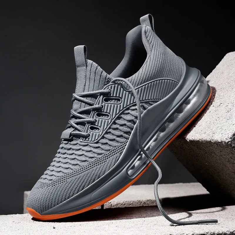 Men's low-top black mesh running shoes with rubber sole and lace-up front