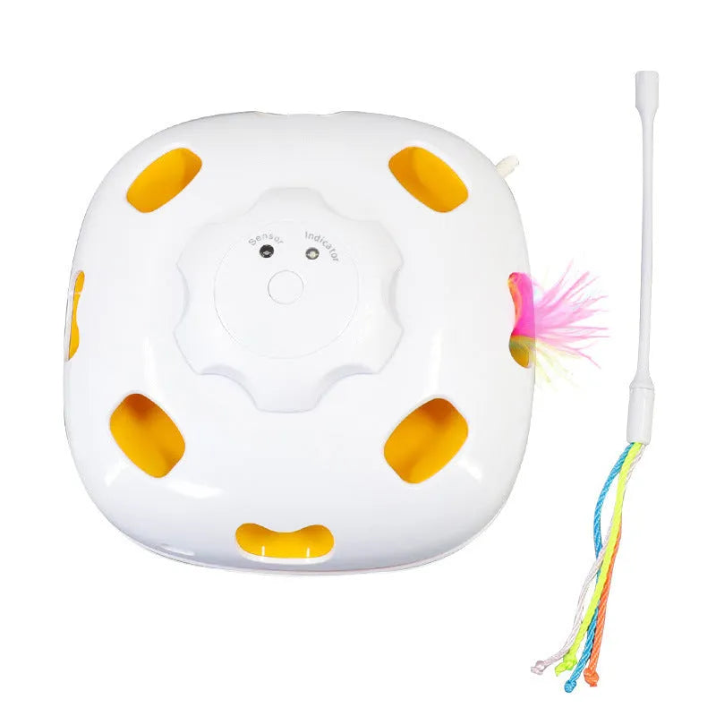 Plastic self-moving cat teaser toy measuring 19.8 x 11.5 x 19.5 cm in picture colour