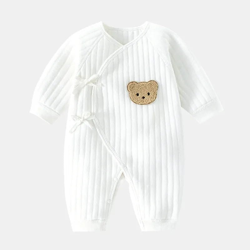 White cotton newborn jumpsuit with top fly lace closure and jacquard teddy bear straps
