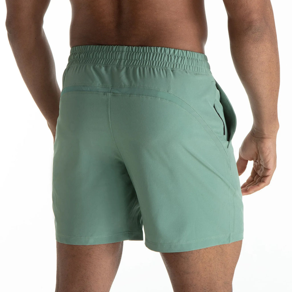 Men's black quick-dry sport shorts with white contrast mesh stitching on the sides.