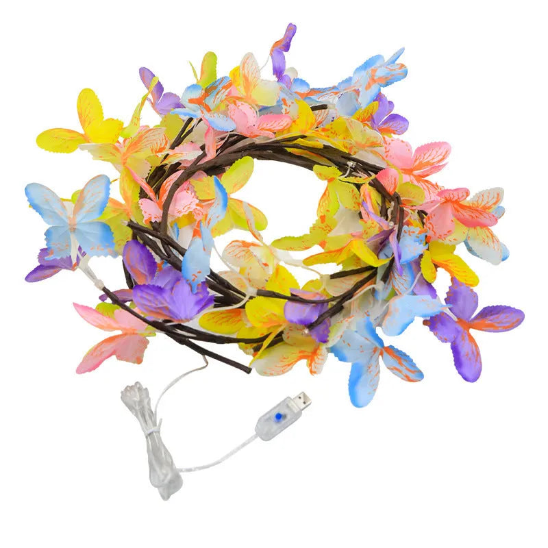 LED butterfly tree rattan lamp with flexible branches and colourised butterfly decorations