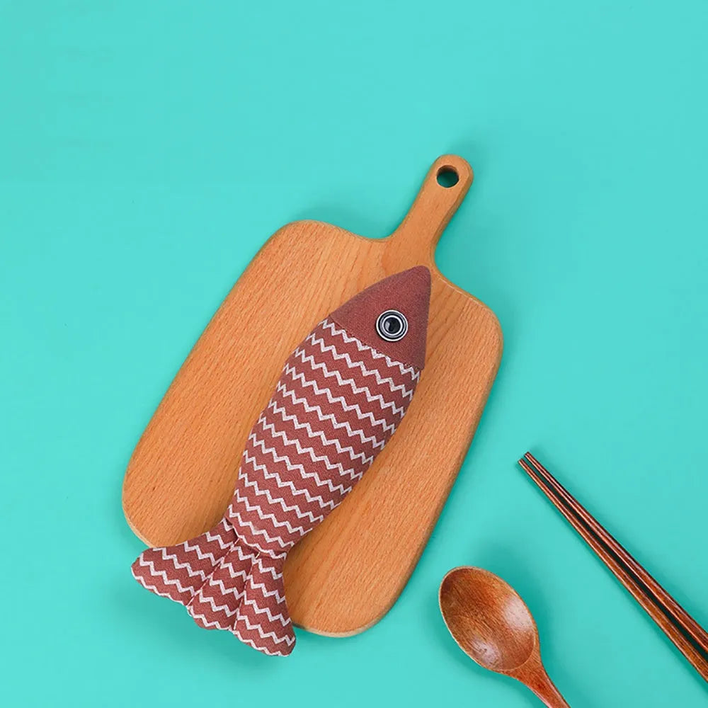 Burlap fish catnip cat toy in bright colour with crinkle sound, 8.27 inches long, on floor
