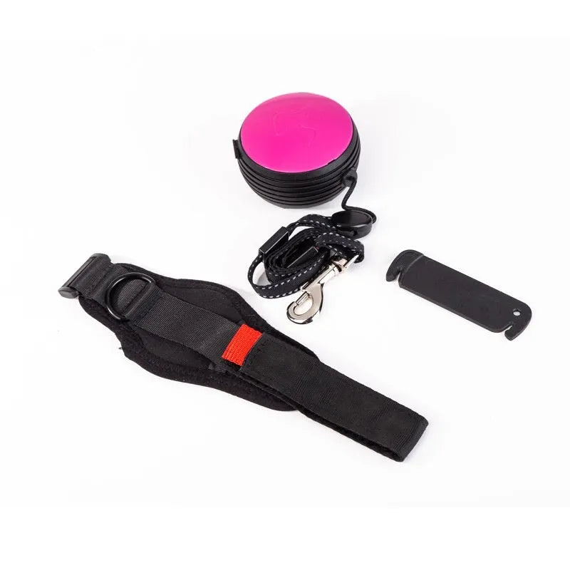 Vibrant orange automatic retractable pet leash extended to 3 metres.