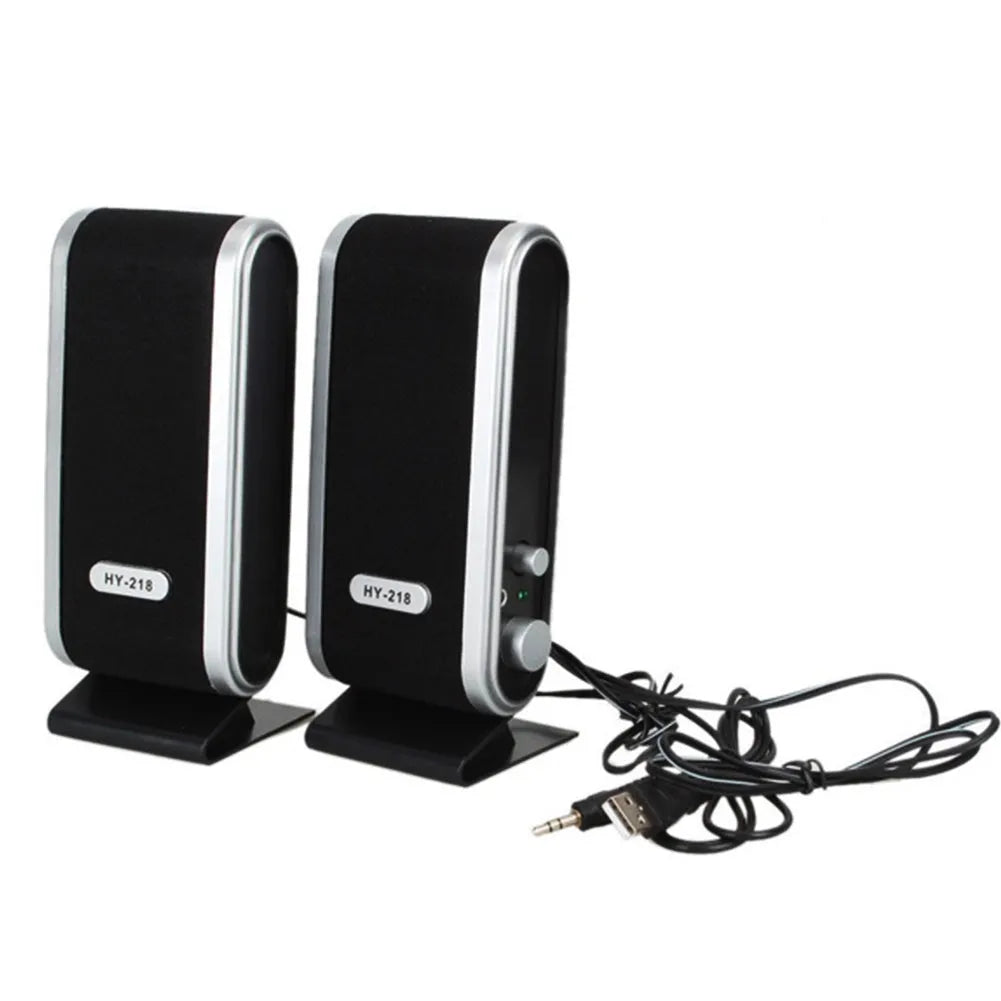 Black notebook mini speaker with USB cable for computer audio enhancement