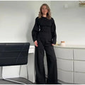 Women's long sleeve polar fleece suit set in apricot colour, showing O-neck top and wide-leg trousers.