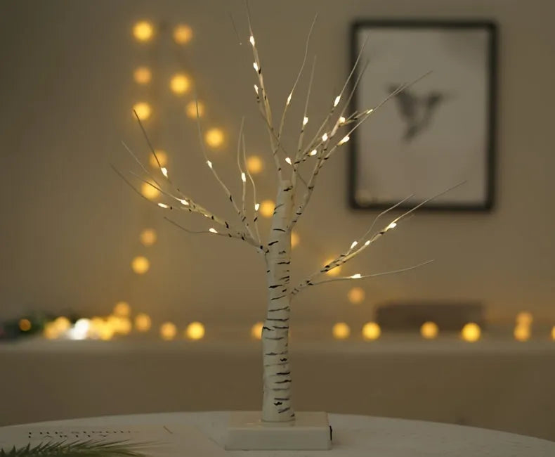 60cm USB birch light with warm white LEDs, black artificial branch on a table