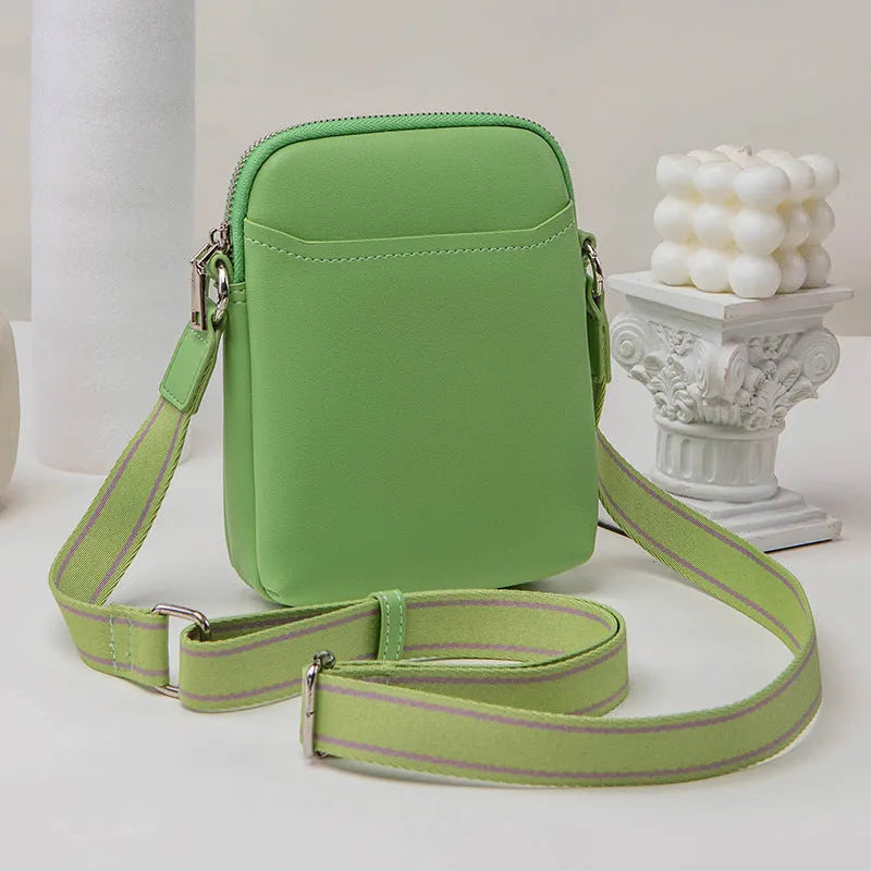 Solid colour PU leather mobile phone crossbody bag measuring 14.5x5.5x19cm