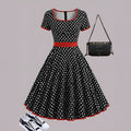 Women's multicolour polka dot midi dress with a square collar, short sleeves, and a front zipper.