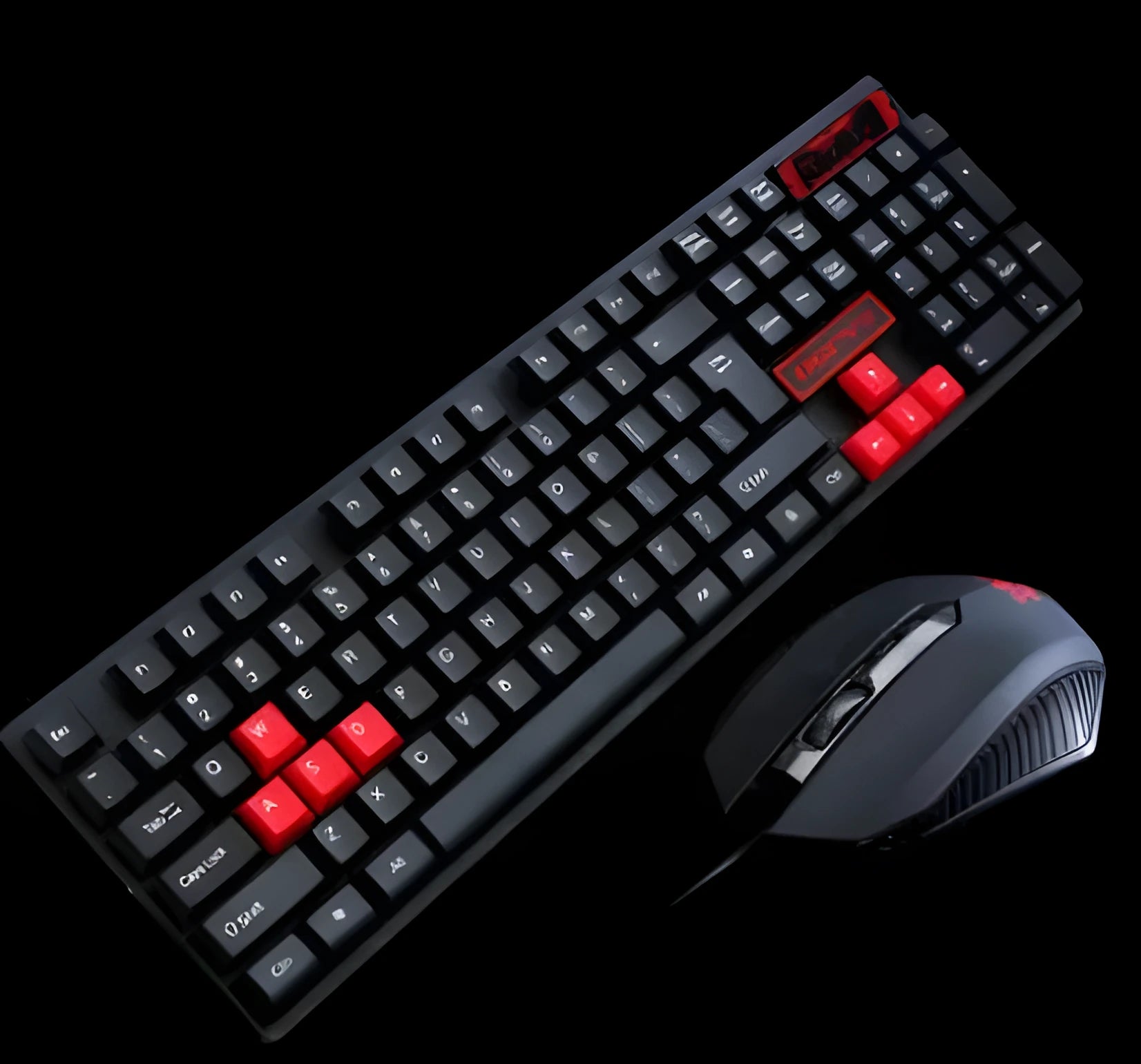 Wired USB keyboard and mouse set with backlit keys and optical mouse on desktop