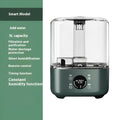 Green KC-112 touch screen humidifier with remote control on display surface