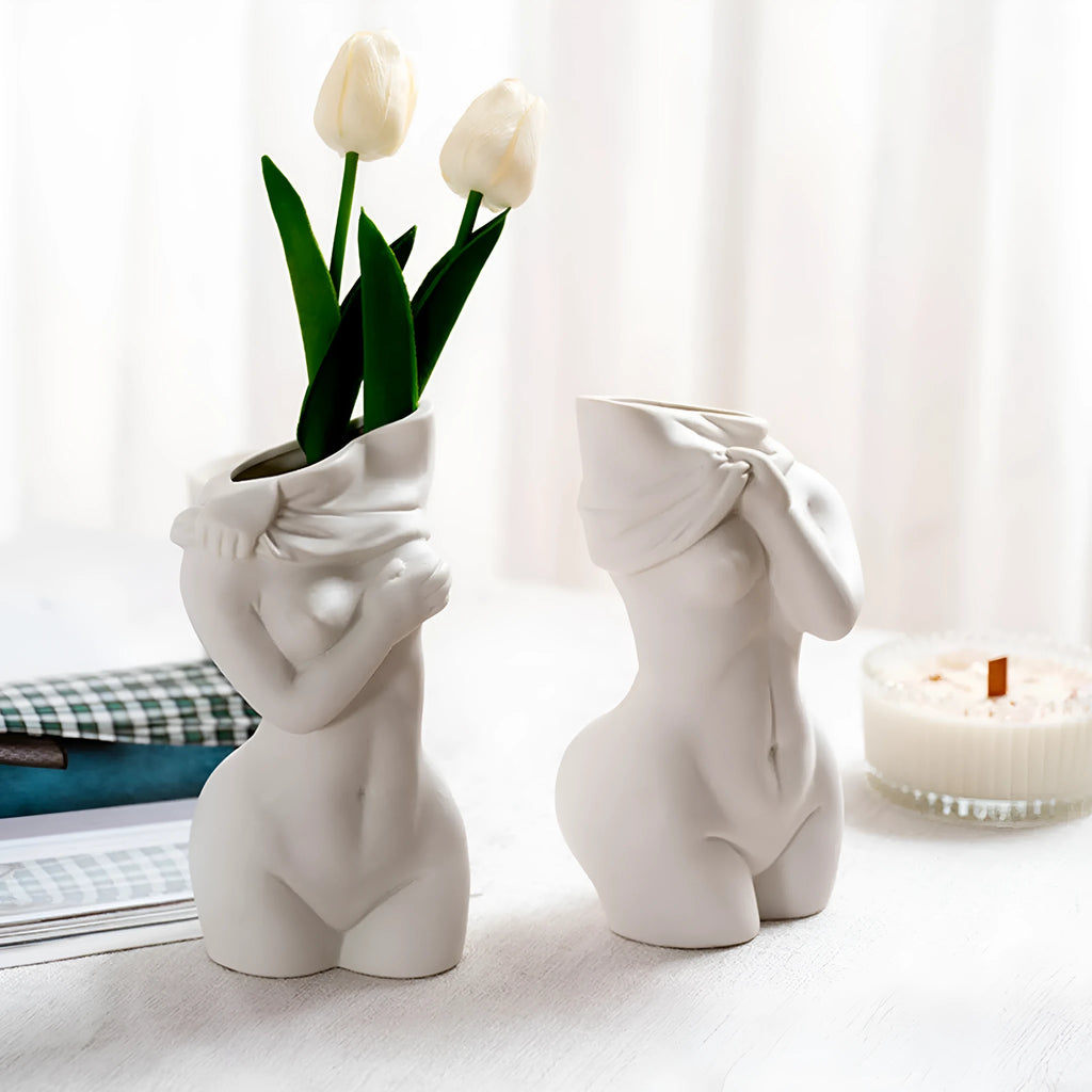 White porcelain figurative human vase with 21.2cm height on a shelf