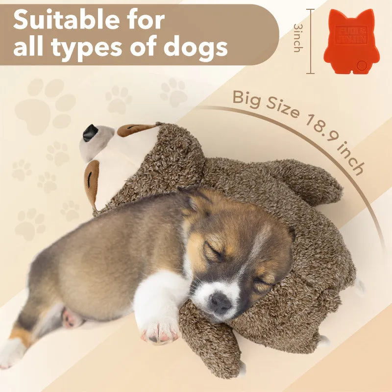 Sloth-coloured pet soothing plush toy with heartbeat device on soft surface