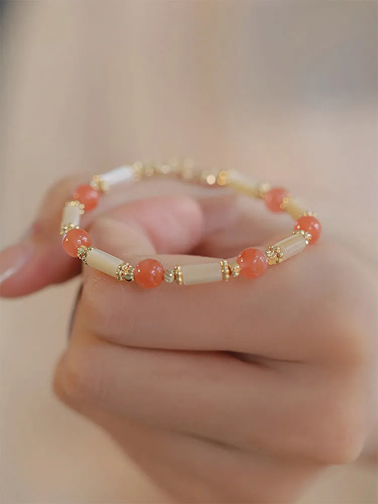 Hetian jade bamboo joint bracelet for women in 6mm size, shown in jade green and South red colour options.
