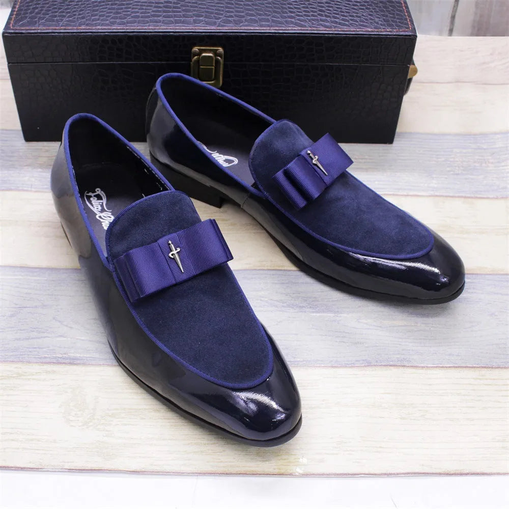 Men's low-top leather shoes in patent black with a tassel detail and rubber sole.