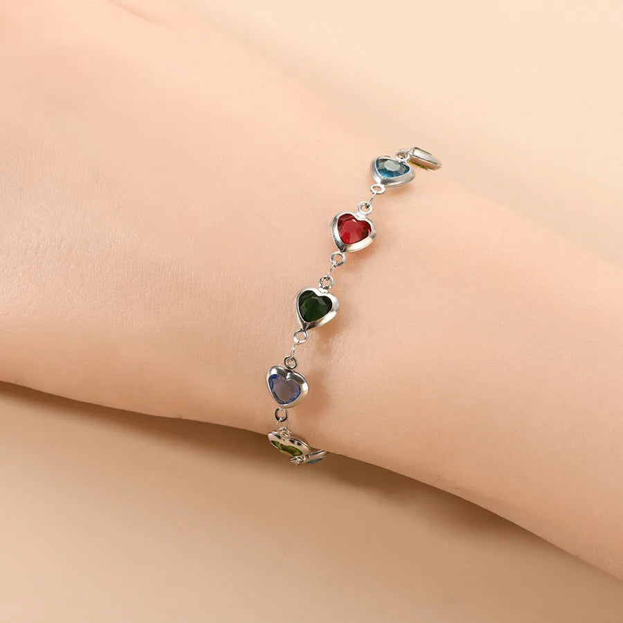 Geometric stainless steel heart bracelet showing six electroplated colour options on white background