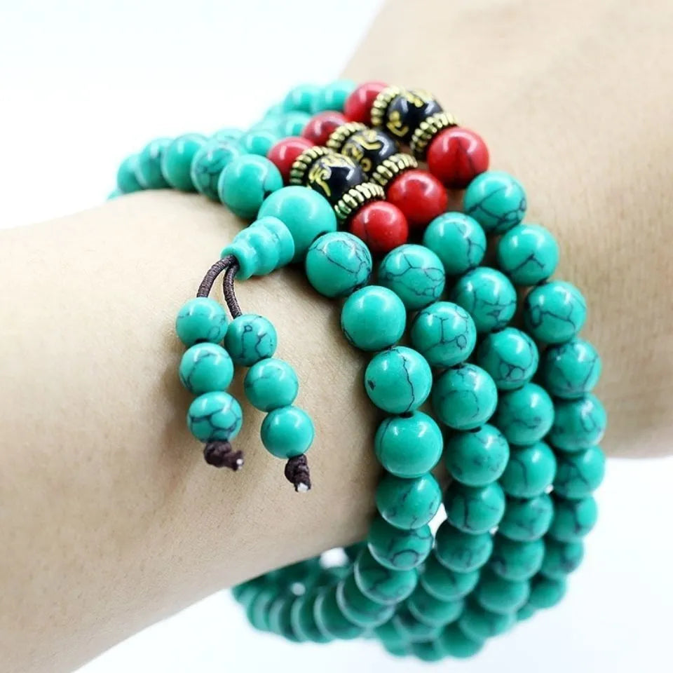 Turquoise Tibetan bracelet with 108 polished synthetic stone powder beads in traditional mala configuration