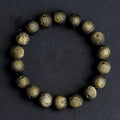 Natural obsidian crater ball bracelet with textured beads in silver or gold meteorite finish