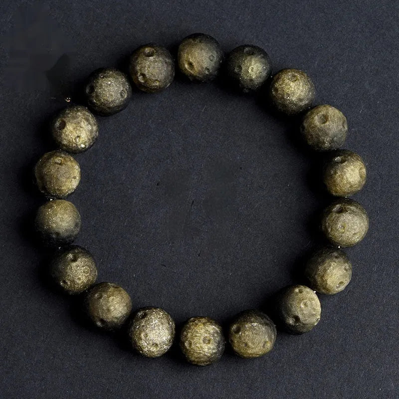Natural obsidian crater ball bracelet with textured beads in silver or gold meteorite finish