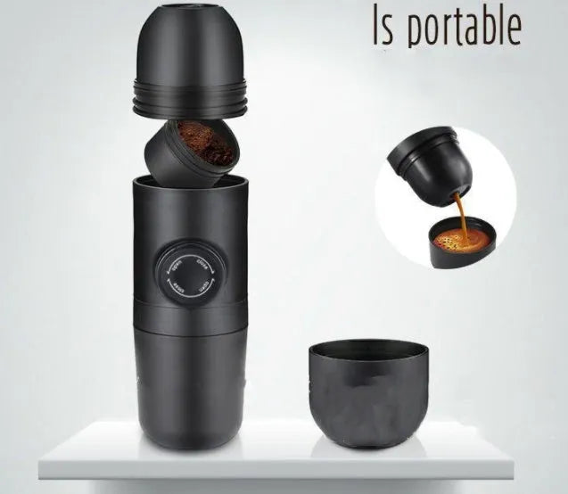 Black portable manual coffee machine showing compact 6x17.5cm design with stainless steel components