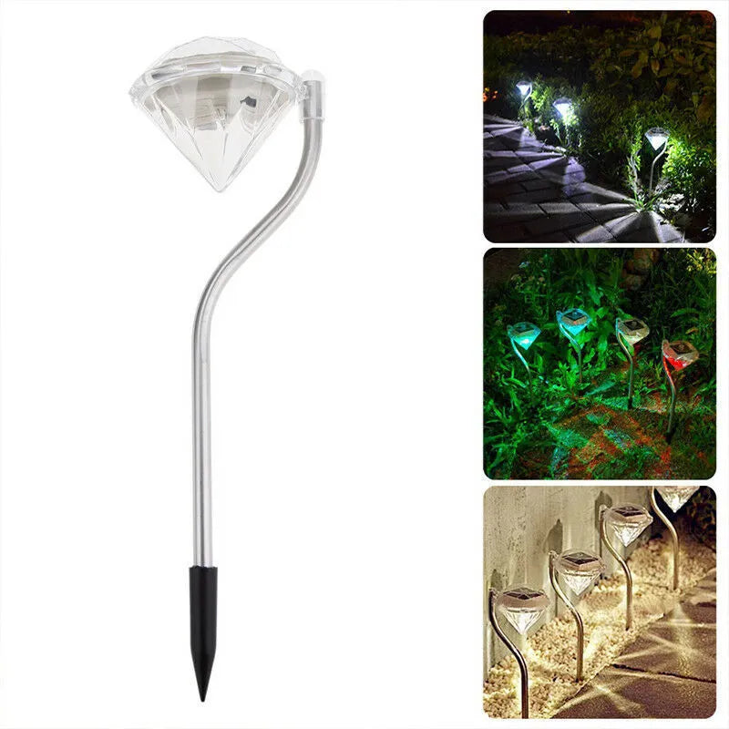 White solar-powered diamond-shaped garden light with adjustable angle and solar panel on top.