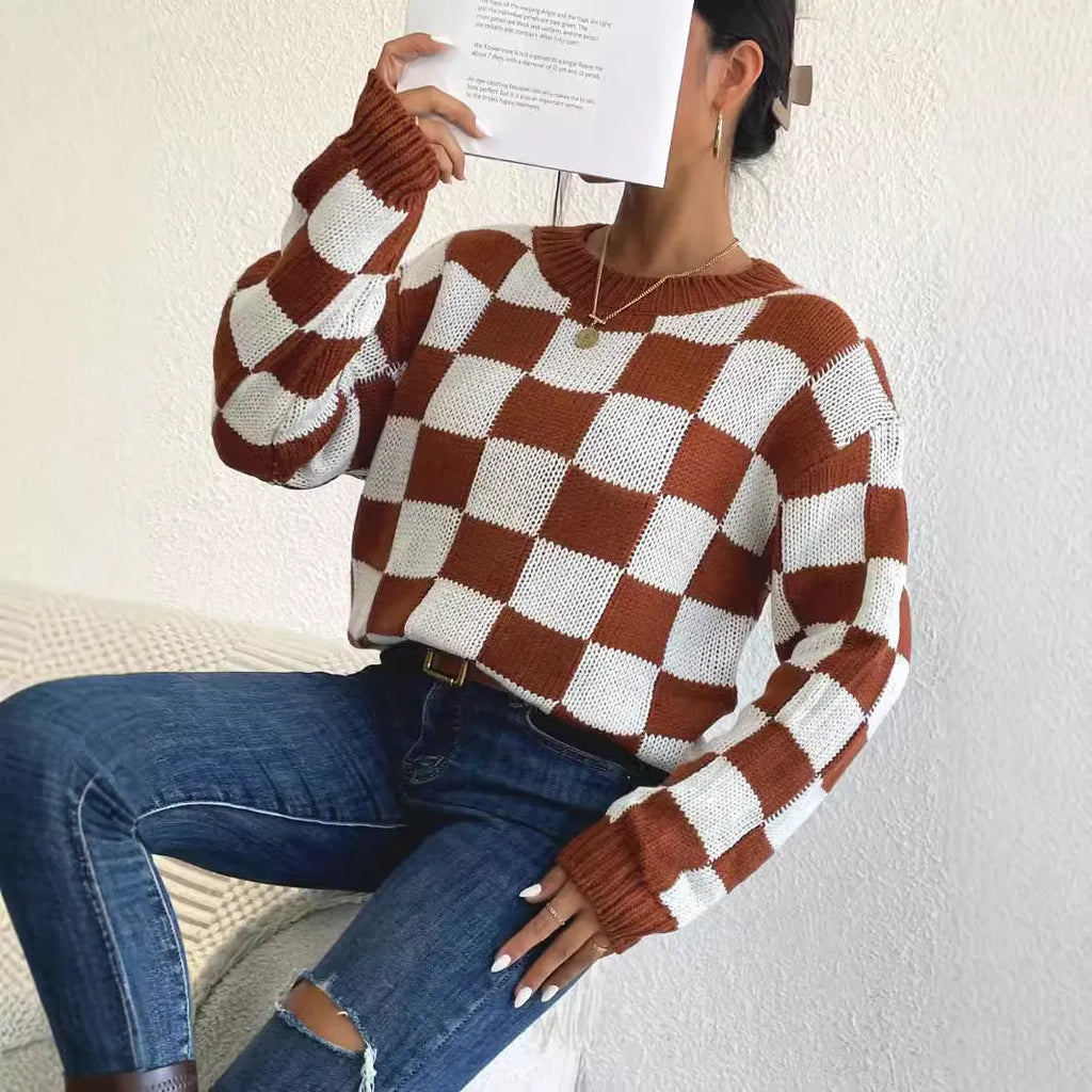 Dark brown plaid pattern on a loose-fitting acrylic pullover sweater with long sleeves