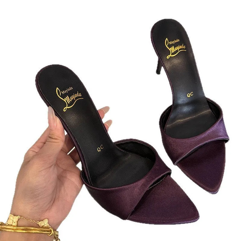 Women's black patent leather pointed toe sandals with an 8cm stiletto heel and ankle strap.