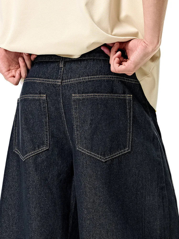 Men's wide-leg denim trousers in original cow colour cotton fabric showing American casual styling