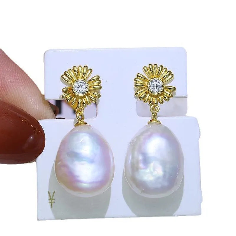 S925 sterling silver baroque flower drop earrings and matching ring holder set on a plain background.