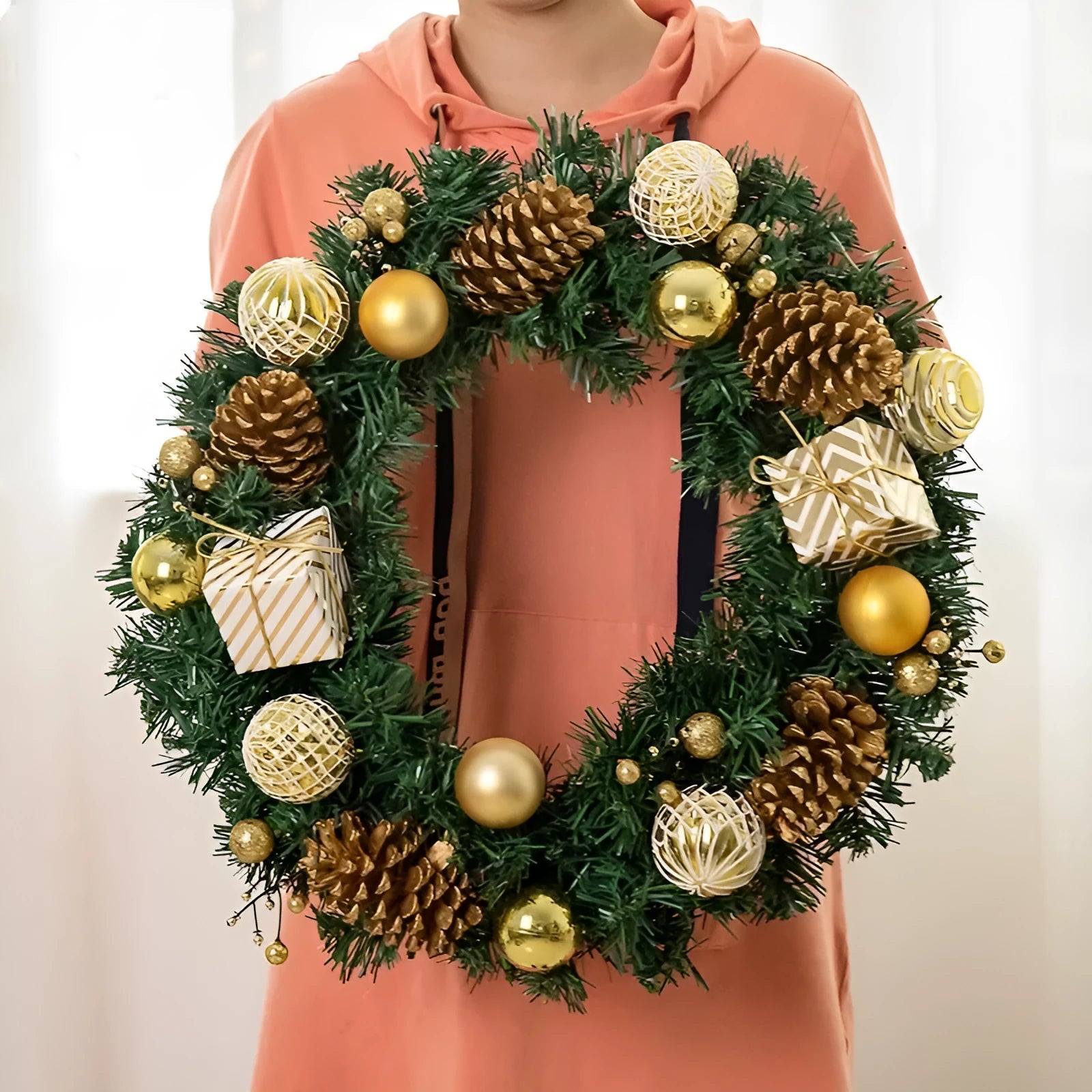 PVC Christmas door hanging wreath with red gift bag design and vine rattan details, 35cm diameter