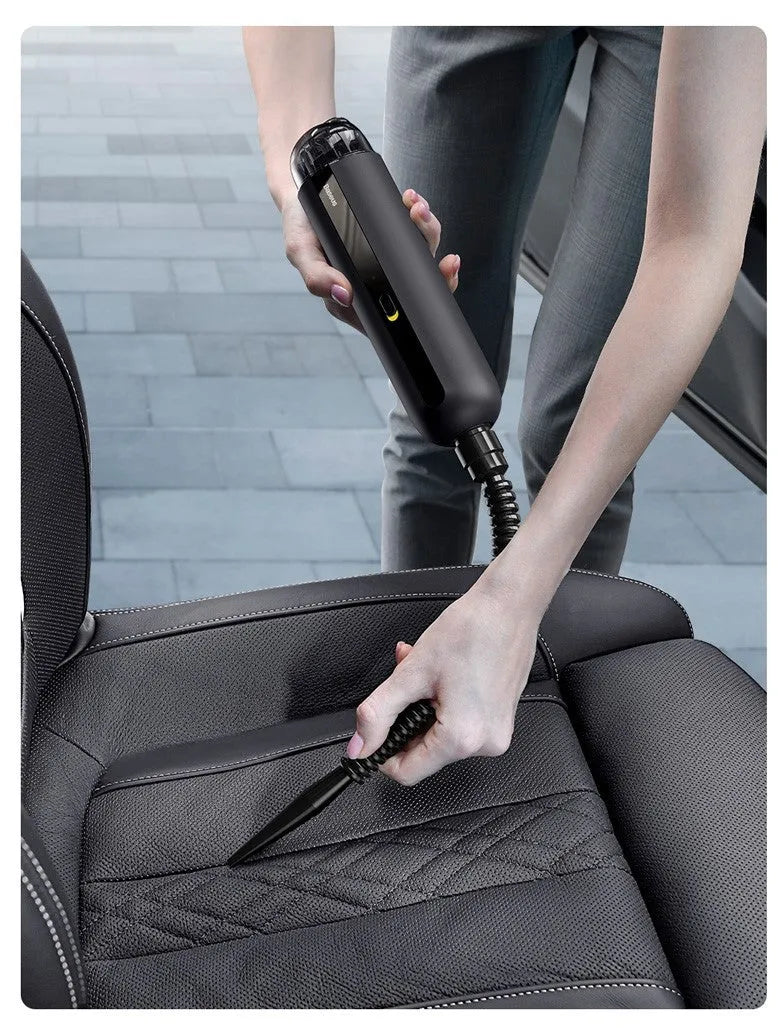 Baseus wireless handheld car vacuum cleaner in black, white, or green with blowing hose attachment.