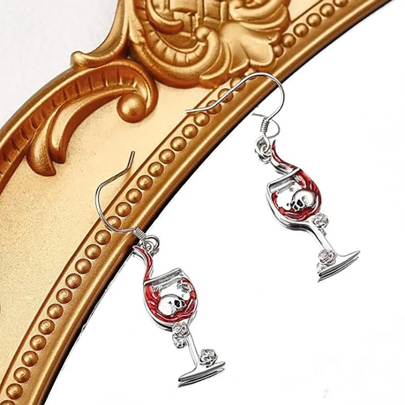 Pair of Halloween earrings featuring a skull shaped like a wine glass, made from electroplated zinc alloy.