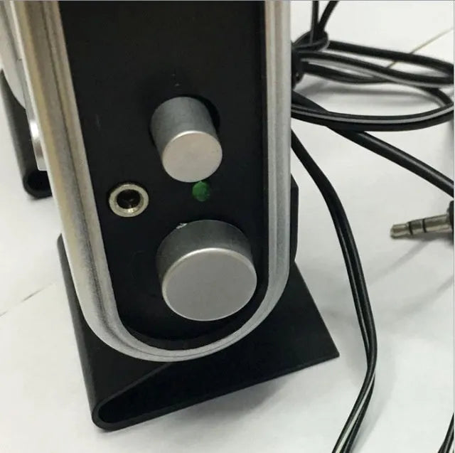 Black notebook mini speaker with USB cable for computer audio enhancement