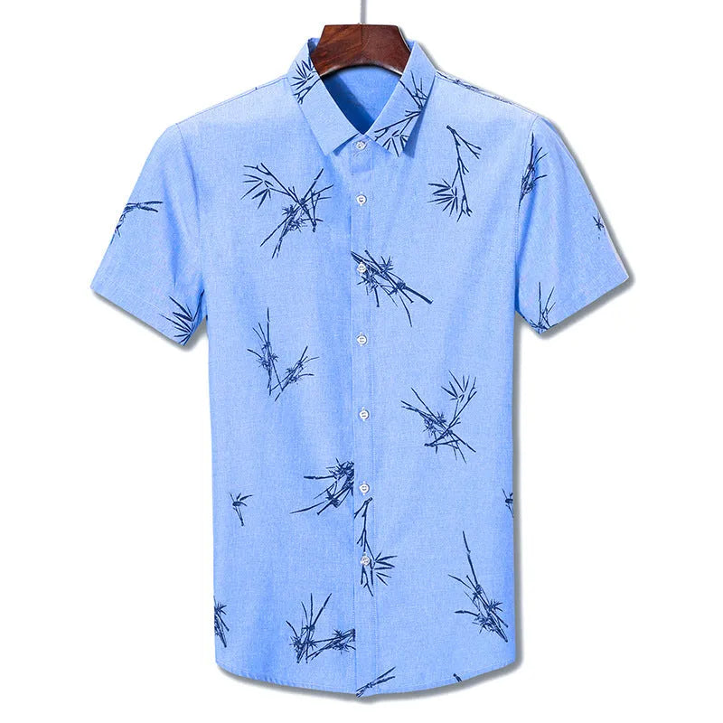 Men's printed slim fit short-sleeve shirt with pointed collar in blue – polyester blend no-iron fabric